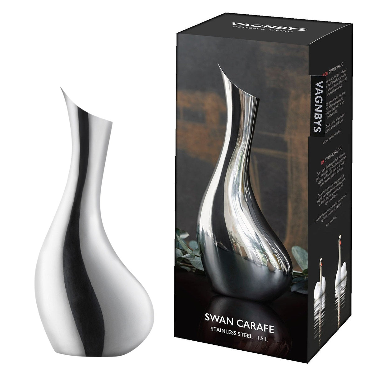 VAGNBYS Swan Carafe 1.5L in polished stainless steel beside its box